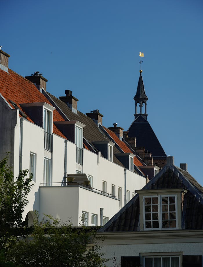 Charming historic buildings in Amersfoort, Netherlands under a clear blue sky.